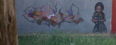 Graffito an einer Dorfmauer